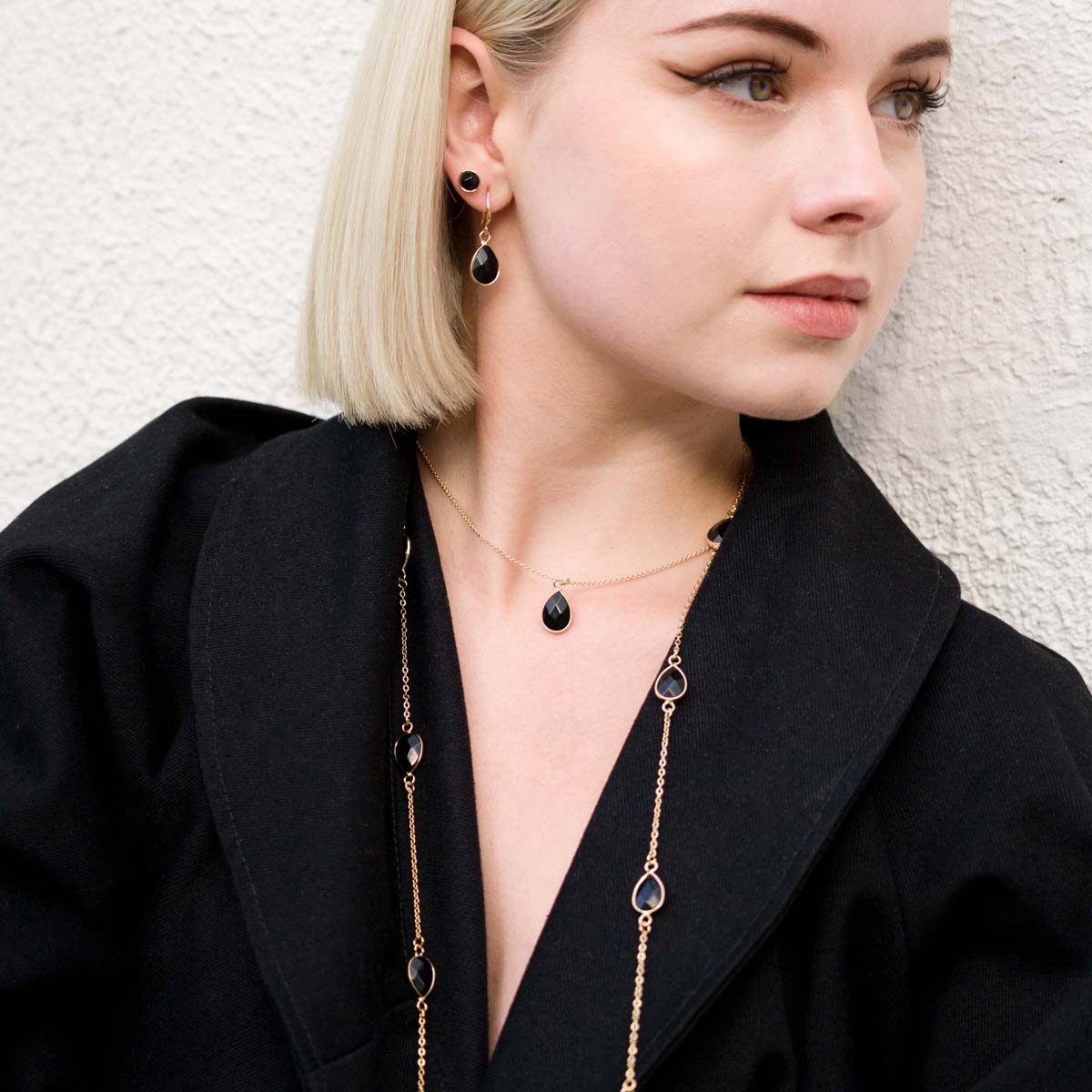 Model wearing Semi-Precious Stone Set in Gold & Black Spinel