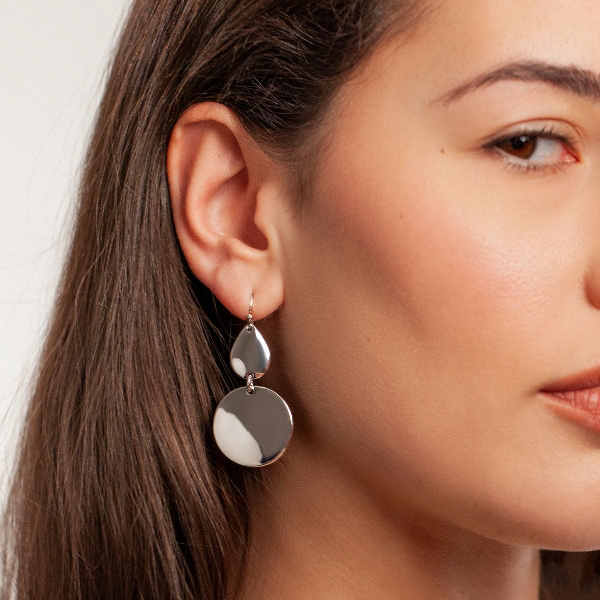 Model wearing Eternal Geometric Dangle Earrings in Silver