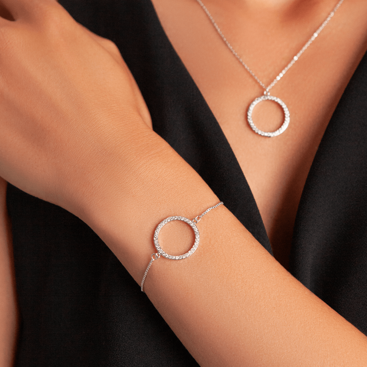 Model wearing Vivienne Circle Drawstring Bracelet White Gold