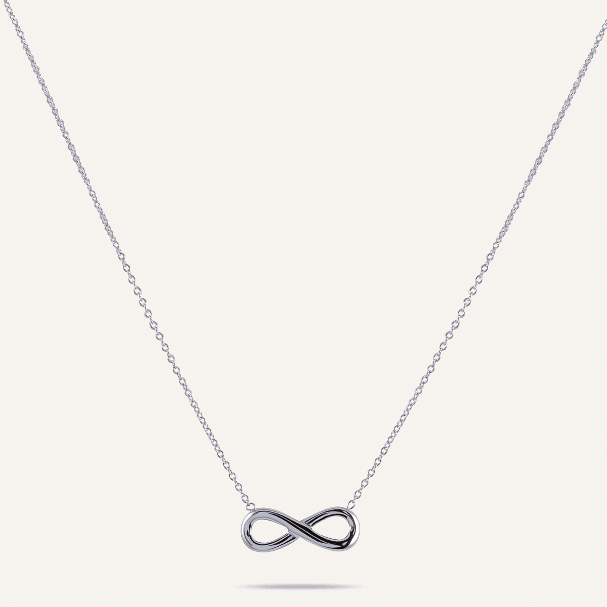 Keira Infinity Symbol Pendant Necklace In White Gold - D&X Retail