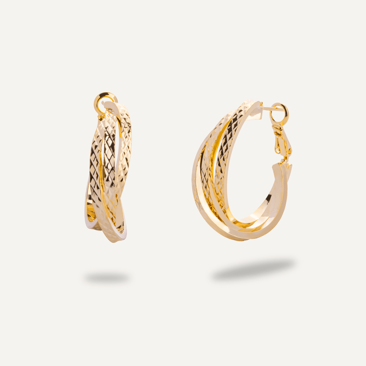 Vivienne Twisted Hoop Earrings In Gold - D&X Retail