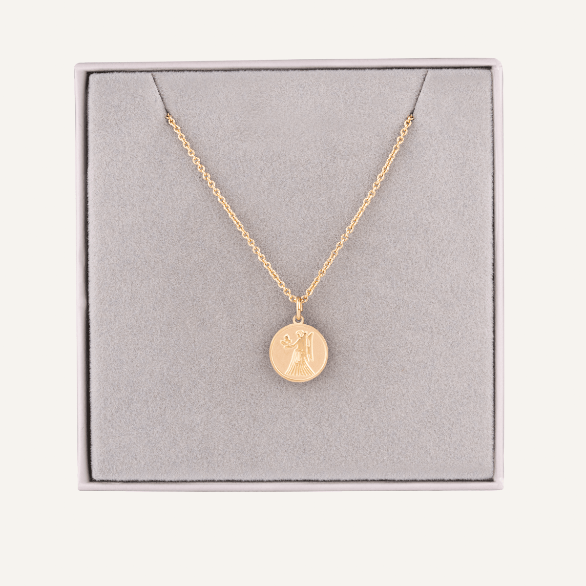 Close-up view of Virgo Zodiac Star Sign Necklace In Gold (Aug 23 – Sep 22)