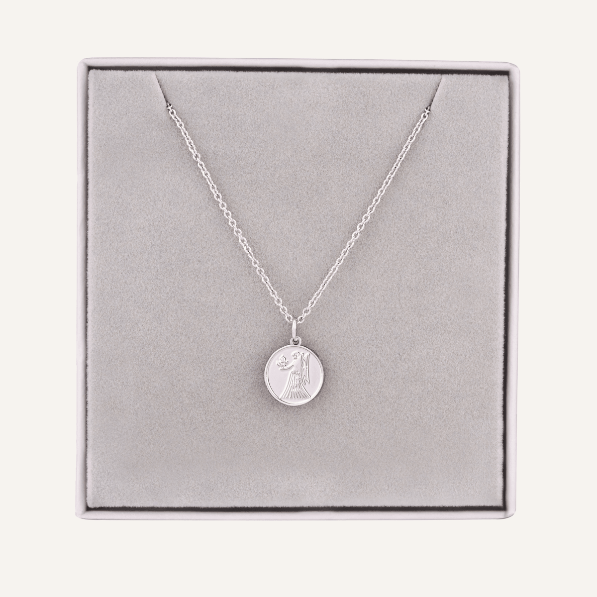Close-up view of Virgo Zodiac Star Sign Necklace In Silver (Aug 23 – Sep 22)