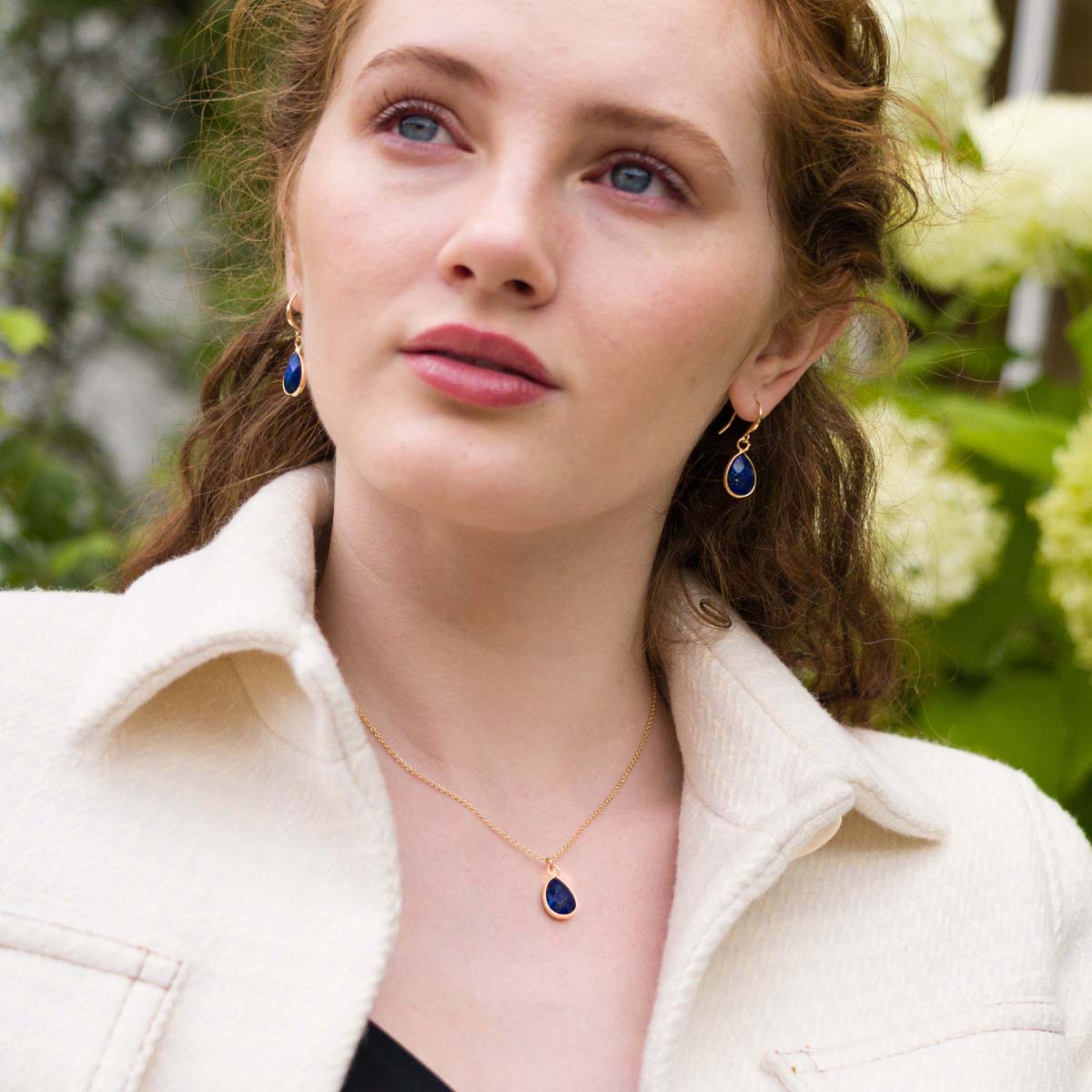 Model wearing Semi-Precious Stone Set in Gold & Lapis