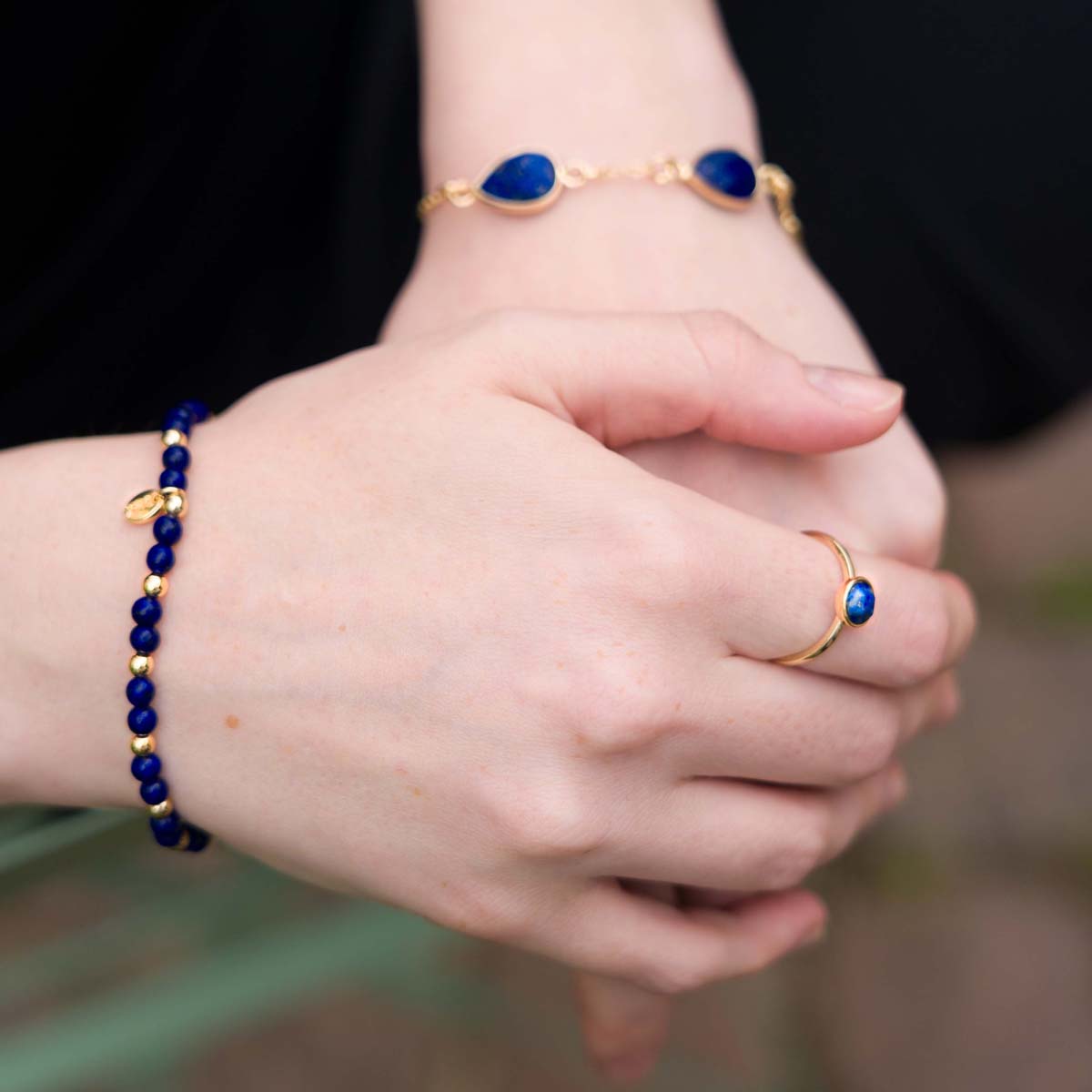 Model wearing Lapis Gem Stone Gold Ring