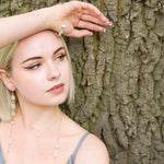 Model wearing Delicate Alexandrite Pearl And Moonstone Gold Clasp Bracelet
