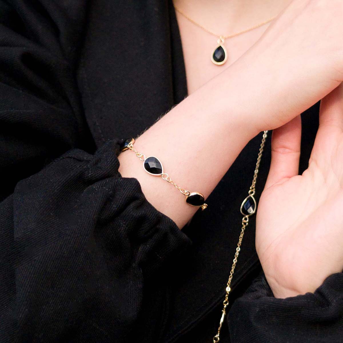 Model wearing Natural Black Spinel Stone Gold Clasp Bracelet