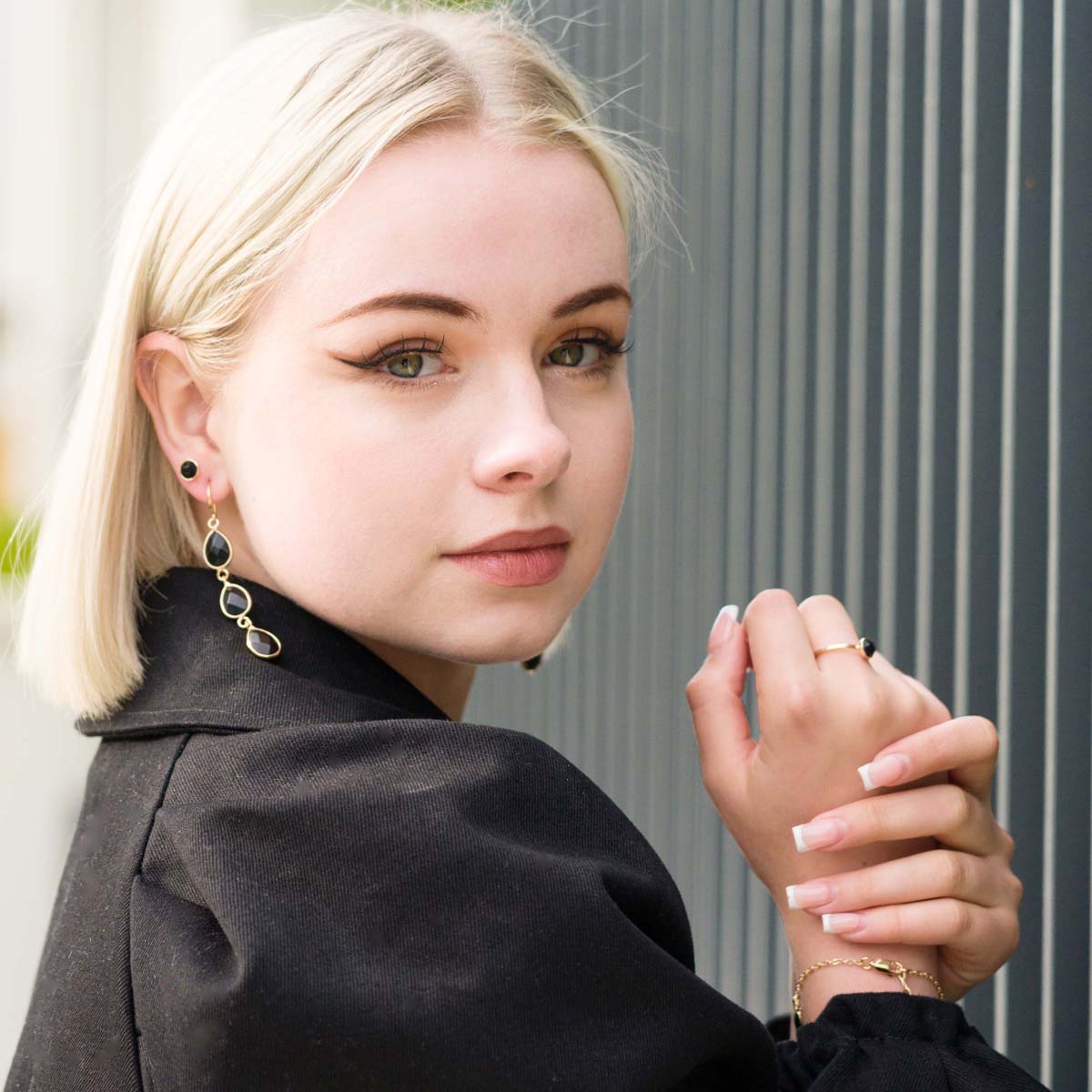 Model wearing Natural Black Spinel Stone Gold Studs