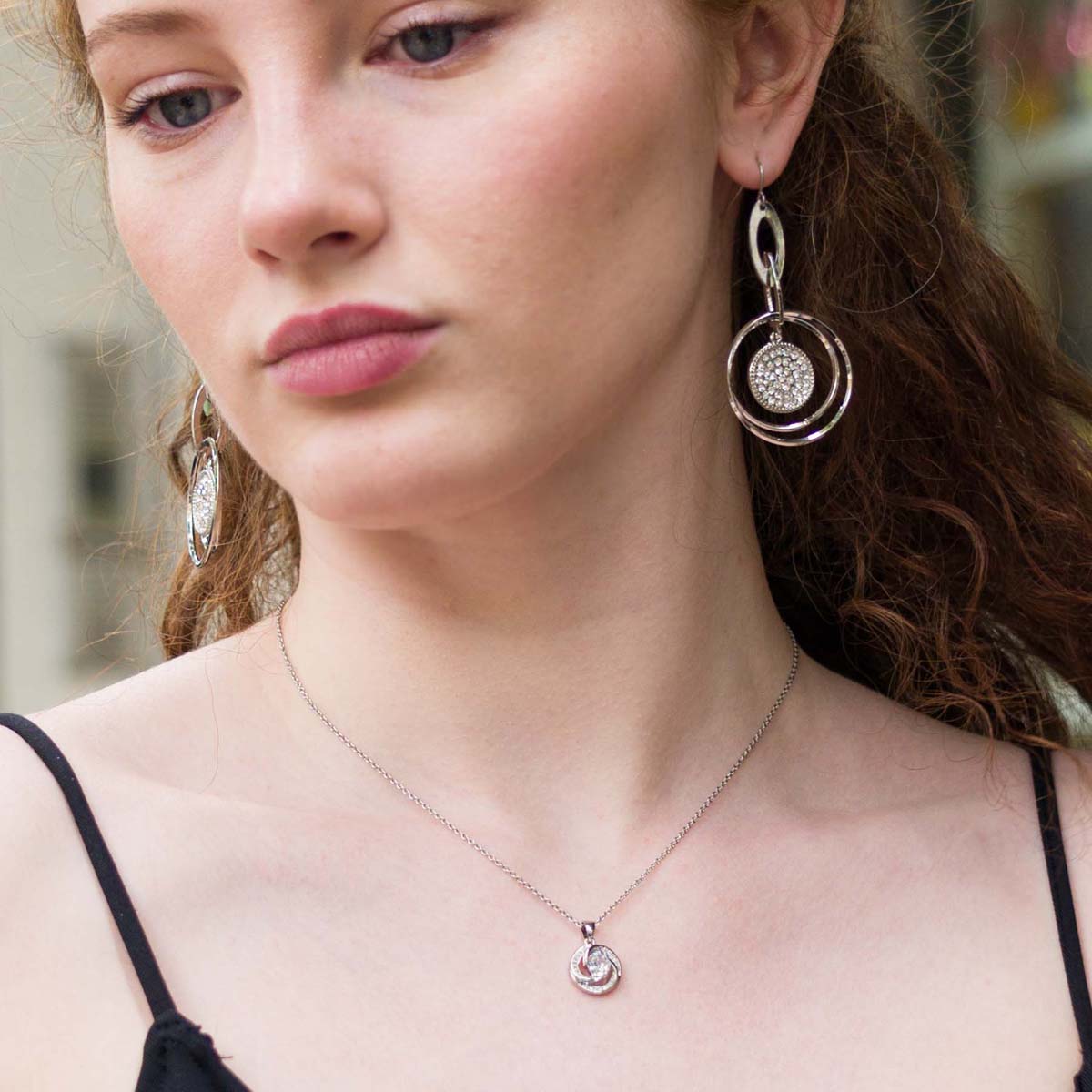 Model wearing Curling Cubic Zirconia Silver Necklace