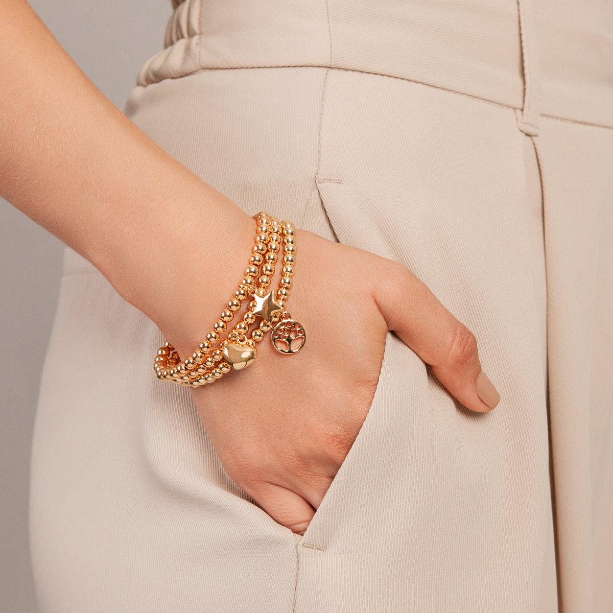 Model wearing Emily Heart Pendant Beaded Bracelet