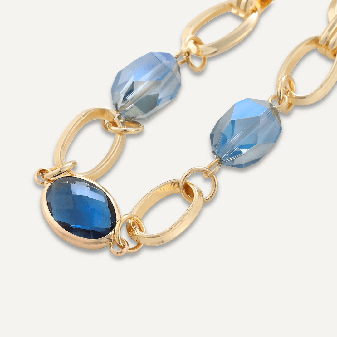 Abstract Blue Crystal Clasp Bracelet In Gold-Tone