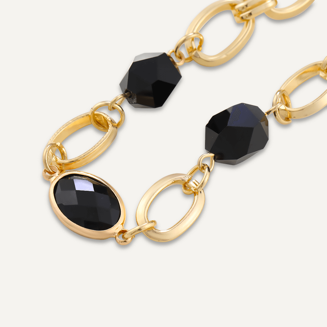 Abstract Black Crystal Clasp Bracelet In Gold-Tone