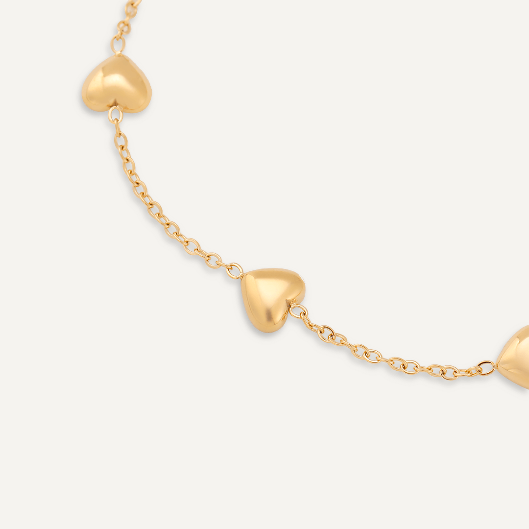 Keira Multi Heart Clasp Bracelet In Gold-Tone