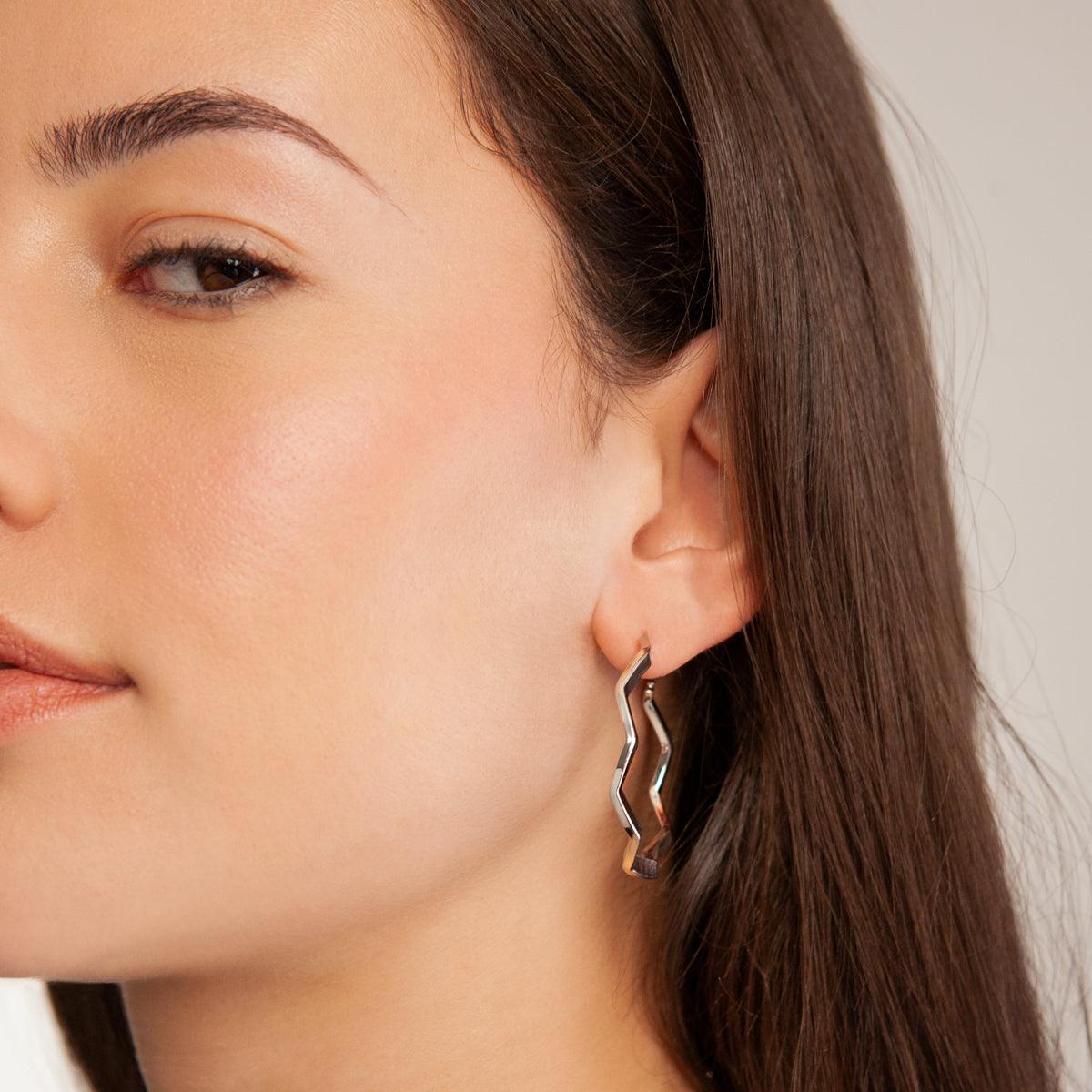 Model wearing Eternal Abstract Hoop Earrings in Silver