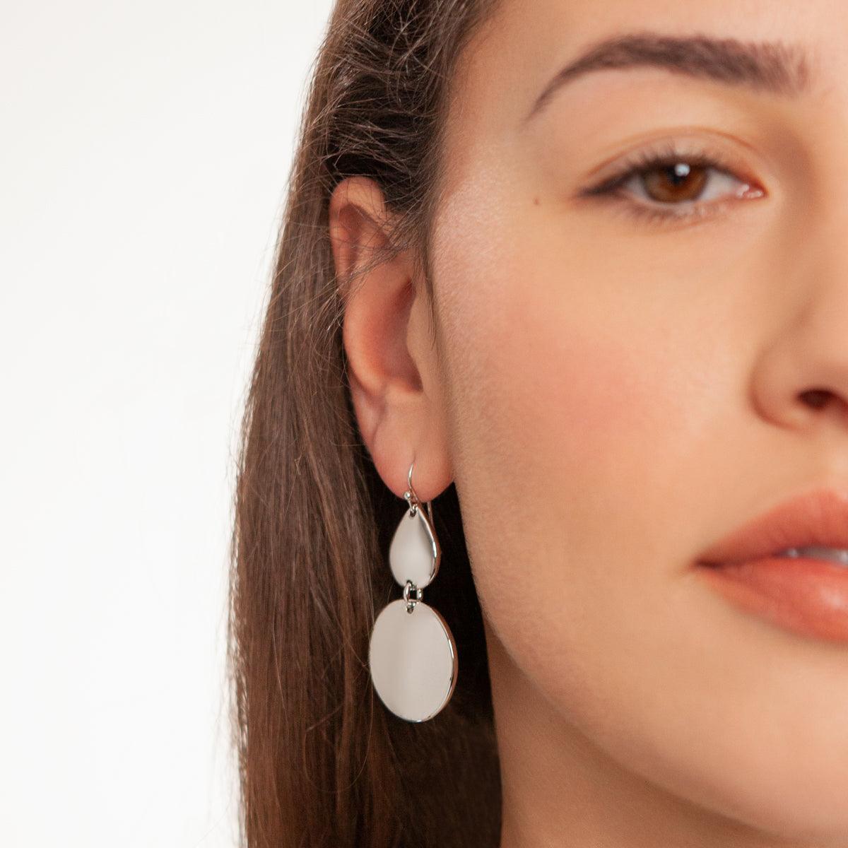 Model wearing Eternal Geometric Dangle Earrings in Silver