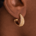 Model wearing Kylie Contemporary Abstract Crystal Earrings In Gold