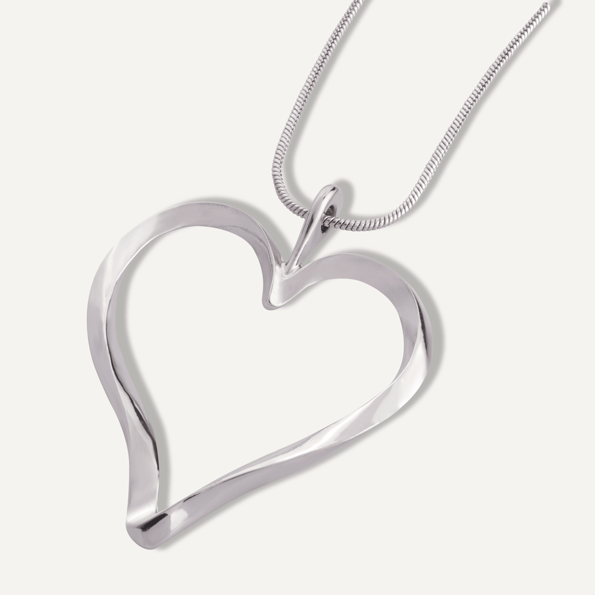 Detailed view of Sweetheart Rhodium Silver Curved Heart Pendant Necklace