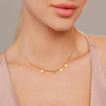 Model wearing Keira Gold Hearts Short Necklace