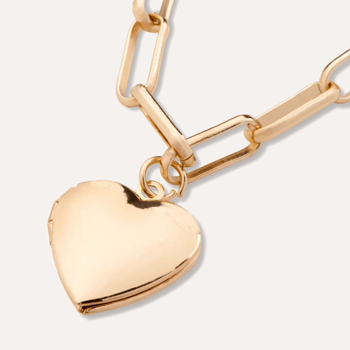 Close-up view of Alesha Heart Necklace Multi-Row Chain-Link In Gold-Tone