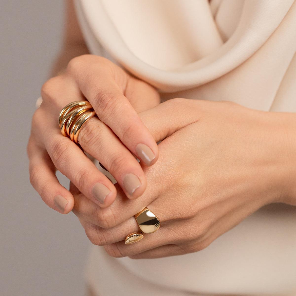 Model wearing Zaha Abstract Bypass Open Band Ring in Gold