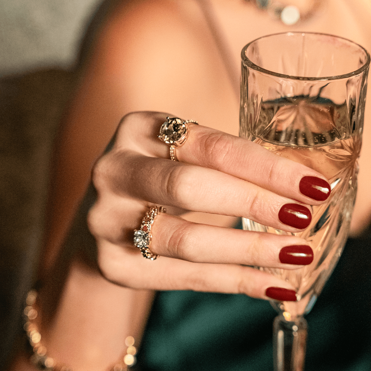 Model wearing Iris Crystal Ring in Smokey Gold