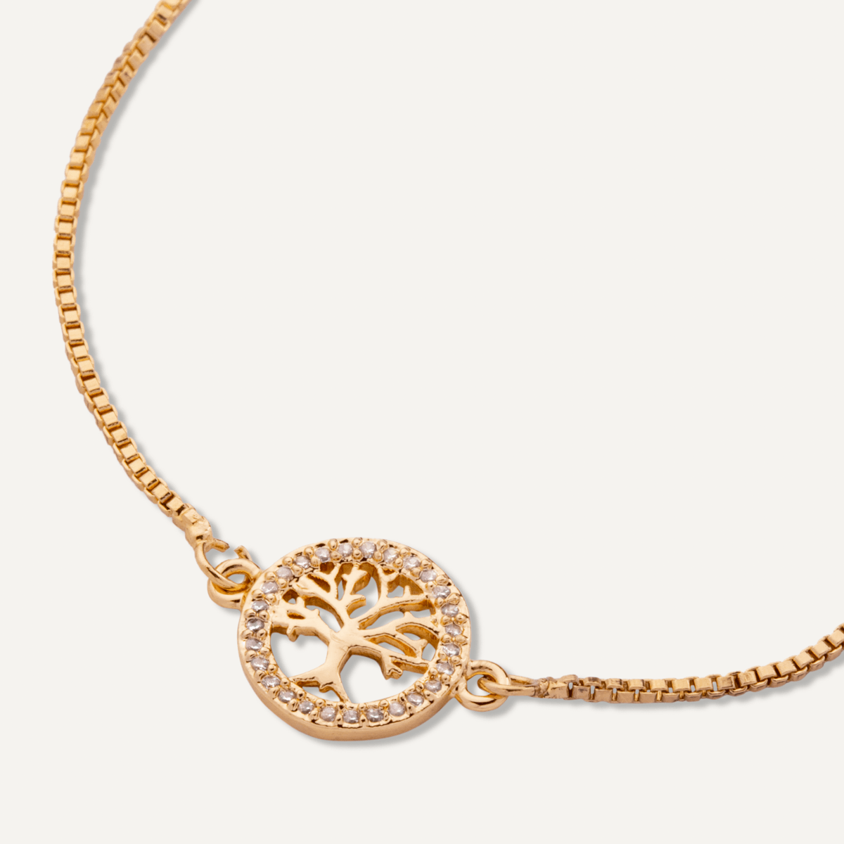 Detailed view of Vivienne Tree of Life Drawstring Bracelet In Gold Cubic Zirconia