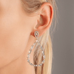 Model wearing Vivienne Teardrop Hoop Dangle Earrings In White Gold