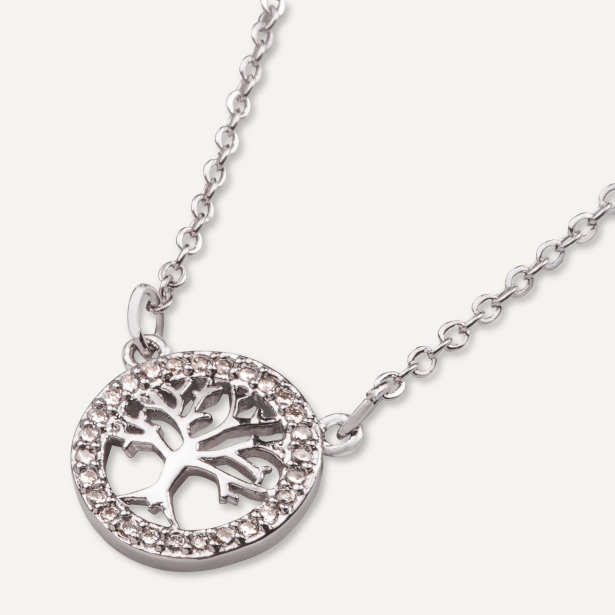 Detailed view of Vivienne Tree of Life Pendant Necklace In White Gold & Cubic Zirconia