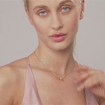 Model wearing Keira Infinity Symbol Pendant Necklace In Gold