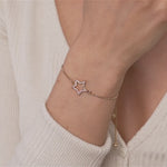 Model wearing Vivienne Star Drawstring Bracelet in Gold Cubic Zirconia