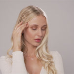 Model wearing Kylie Contemporary Crystal Hairclip In Gold