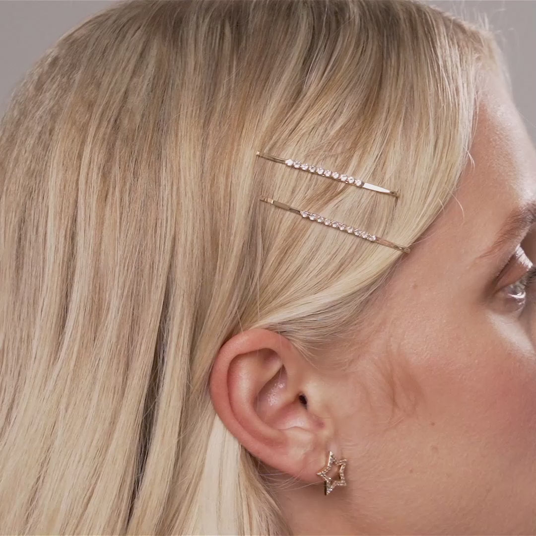 Model wearing Kylie Contemporary Crystal Hairclip In Gold