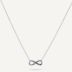 Keira Infinity Symbol Pendant Necklace In White Gold - D&X Retail